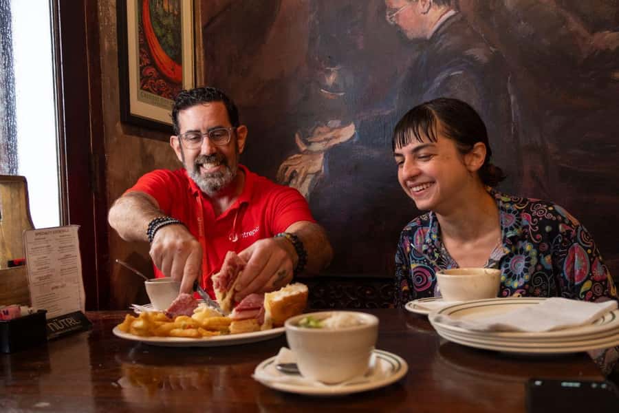 New Orleans: Beloved Bites & Famous Dishes Food Tour - Beignets to start: sweet, hot, and full of context