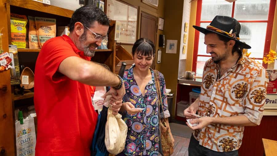 New Orleans: Beloved Bites & Famous Dishes Food Tour - Guide power: the storytelling is a major part of the value