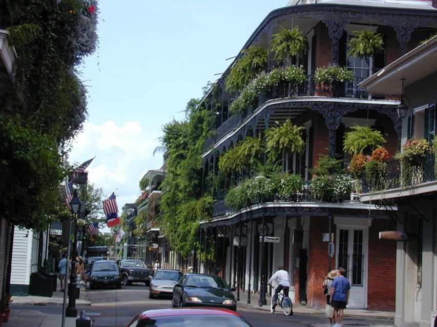 New Orleans: City & Cemetery Tour by Air-Conditioned Minibus - Guide style: funny stories, music cues, and patient explanations