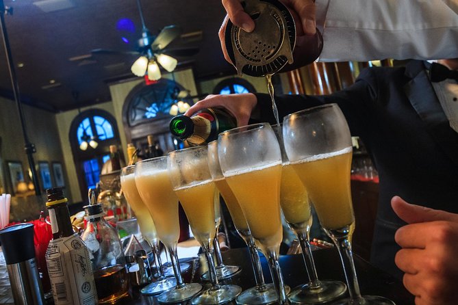 New Orleans Cooking Class and Cocktail Walking Tour - Stop by Stop in the French Quarter: Court of Two Sisters, Peychaud’s, Cathedral Area, and Fritzel’s