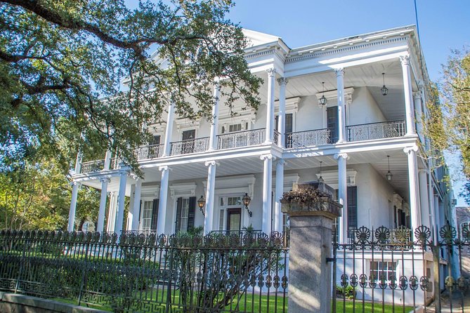New Orleans Garden District History Walking Tour - Lafayette Cemetery #1: tomb views from the iron gates