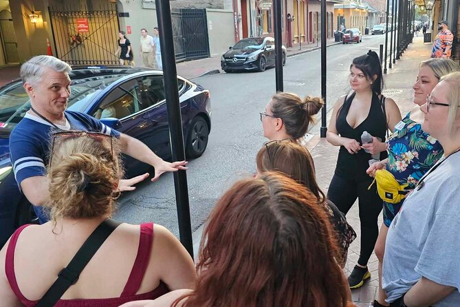New Orleans Lewd Spirits Haunted Tour with Bar Stops - Carrying your drink through the French Quarter street stories