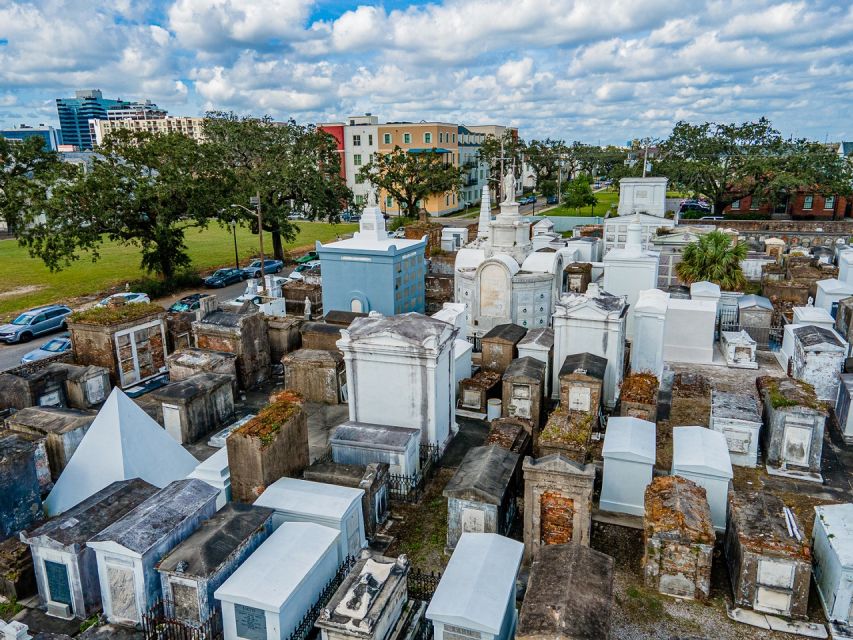 New Orleans: Walking Tour Inside St. Louis Cemetery No. 1 - Nicolas Cage’s pyramid tomb, modern fame meets old stone