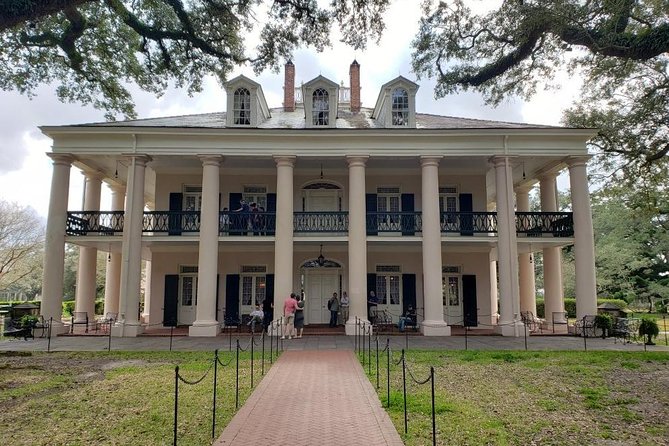 Oak Alley and Laura Plantation Tour with Transportation from New Orleans - Laura Plantation: Creole Sugarcane, Families, and Slave Quarters
